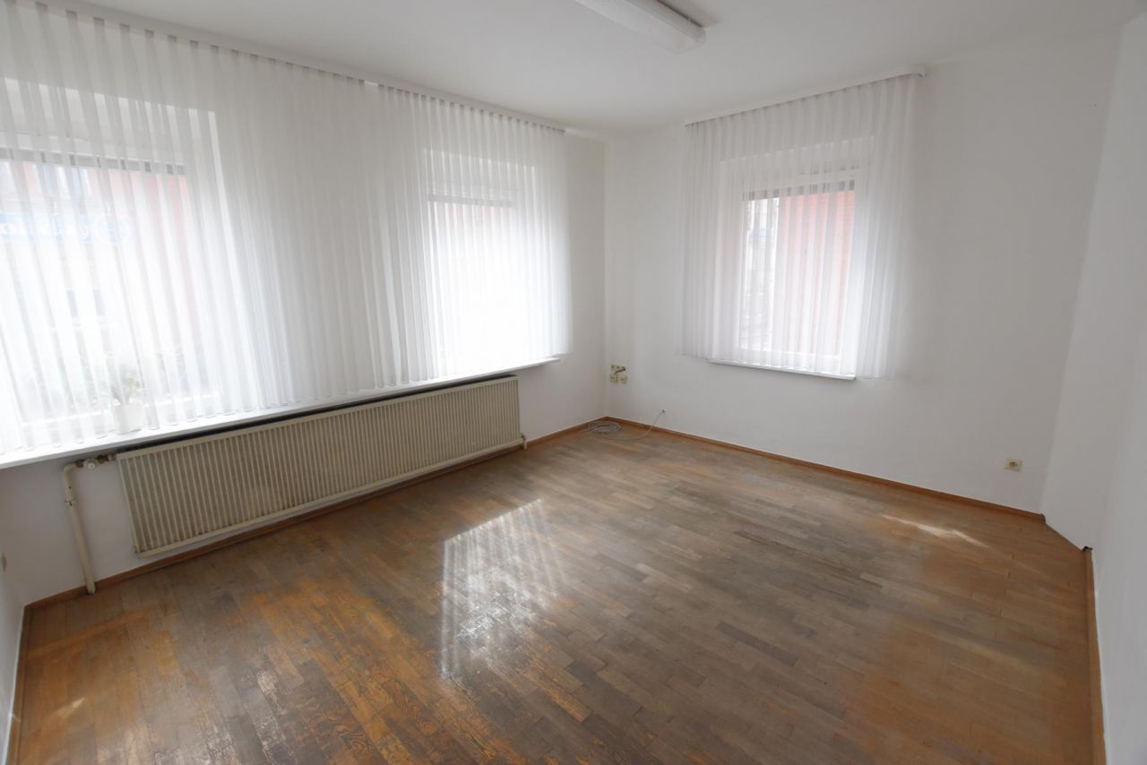 VERKAUFT - Zentrales Mehrfamilienhaus mit Ladenfläche!