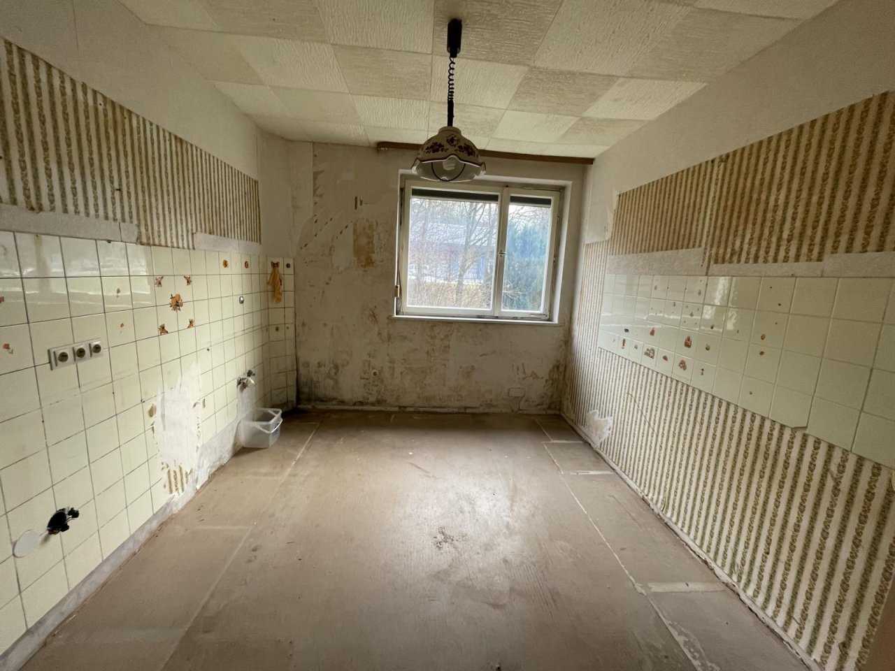 VERKAUFT - Hochparterre-Wohnung mit Potenzial!