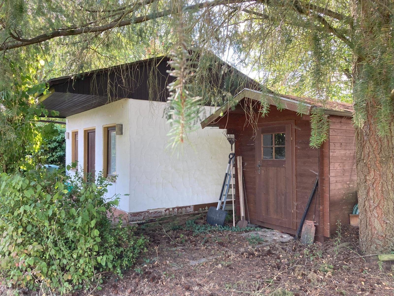 VERKAUFT - Einfamilienhaus mit Terrasse, 2 Balkonen, massivem Gartenhaus und tollem Garten!