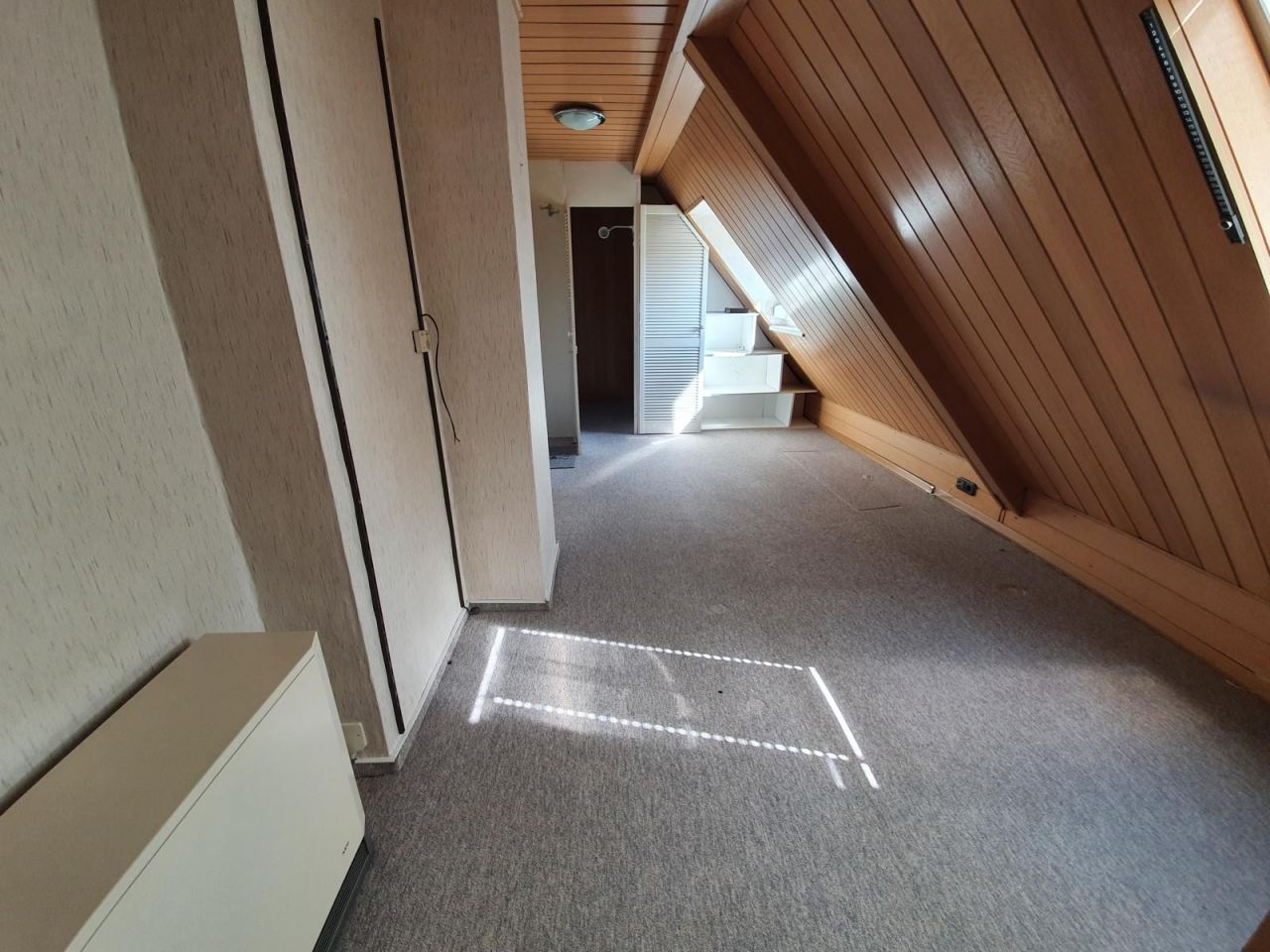 Ausbaufähiges Gästezimmer im DG